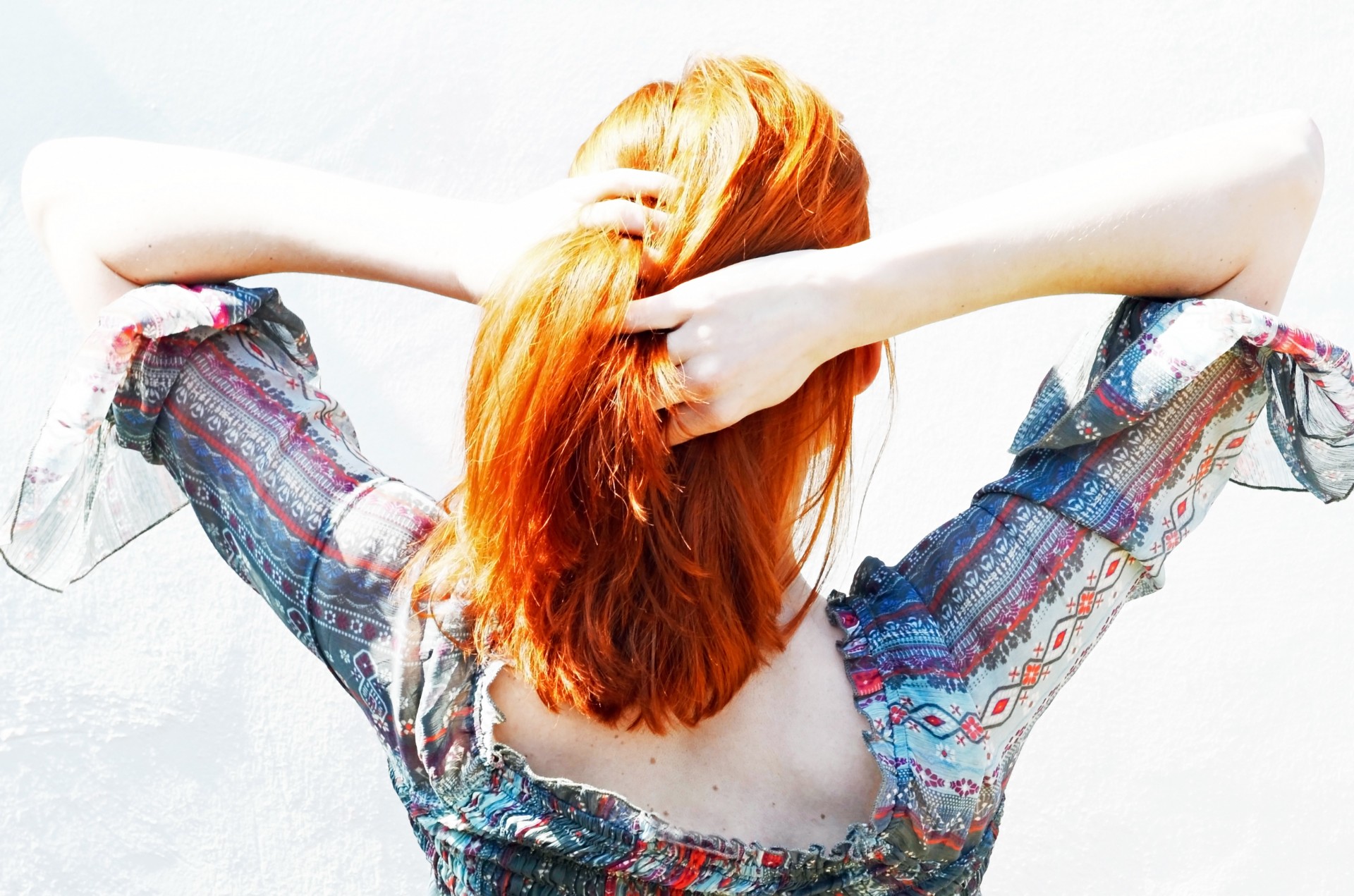 woman-playing-with-her-hair